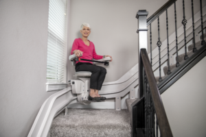 Woman on a curved stairlift
